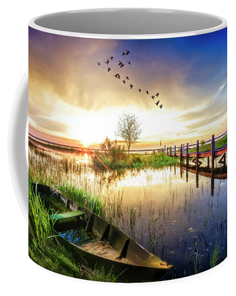 Birds Coffee Mug featuring the photograph Rowboat in the Marsh at Sunset by Debra and Dave Vanderlaan