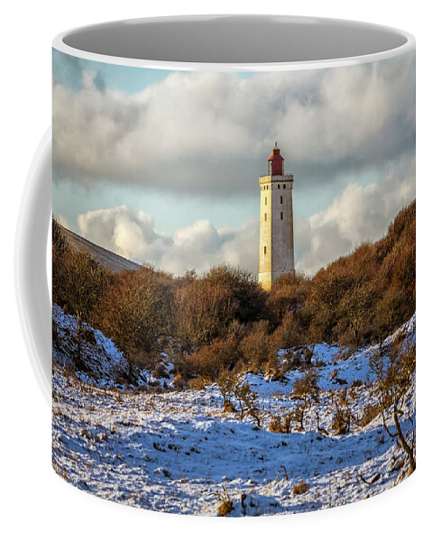 Rubjerg Knude Coffee Mug featuring the photograph Rubjerg Knude Lighthouse in snow by Mike Santis