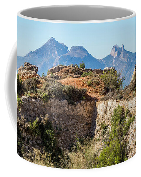 Fortress Coffee Mug featuring the photograph Ruins of an ancient fortress in the mountains by Adriana Mueller