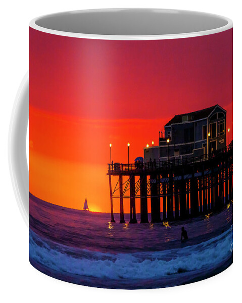 #sunset #oceanside #pier #sailboat #seascape Coffee Mug featuring the photograph Sailboat at Sunset by Rich Cruse