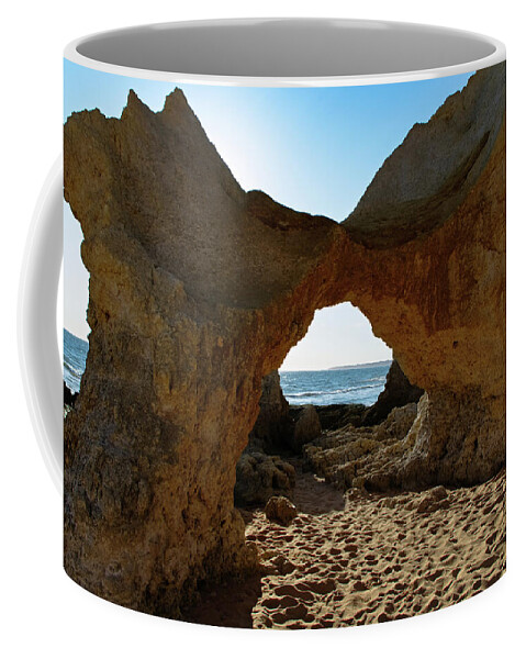 Arch Coffee Mug featuring the photograph Sandstone Arch in Gale Beach. Algarve by Angelo DeVal