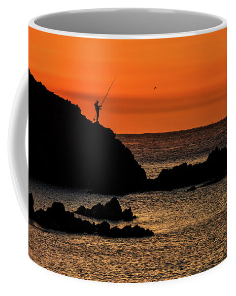 Sea Coffee Mug featuring the photograph Sea Sunrise With Lone Angler On Rock by Artur Bogacki
