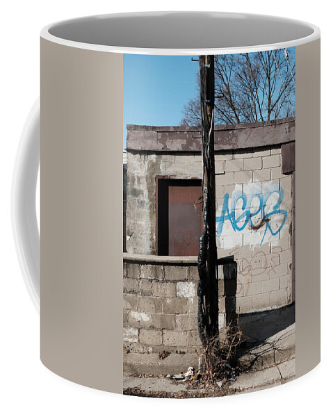 Urban Coffee Mug featuring the photograph Small Shack, Short Wall And A Pole by Kreddible Trout