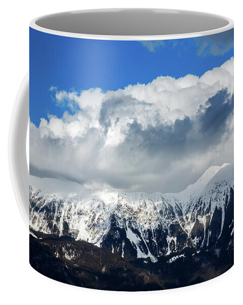 Mountain Coffee Mug featuring the photograph Snowy mountains by Ian Middleton