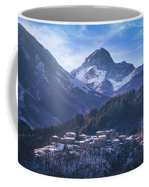 Garfagnana Coffee Mug featuring the photograph Snowy village in Alpi Apuane by Stefano Orazzini