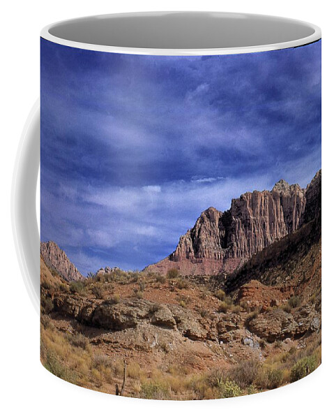 Clouds Coffee Mug featuring the photograph Southwest Solitude by Russel Considine