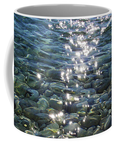 Sea Coffee Mug featuring the photograph Shiny Sun Sparkles on Crystal Clear Sea Water with Transparent View on Pebbles by Aneta Soukalova