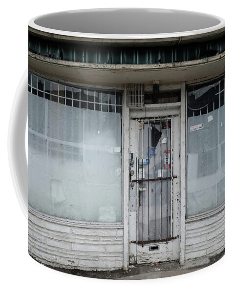 Urban Coffee Mug featuring the photograph Stable Economy by Kreddible Trout