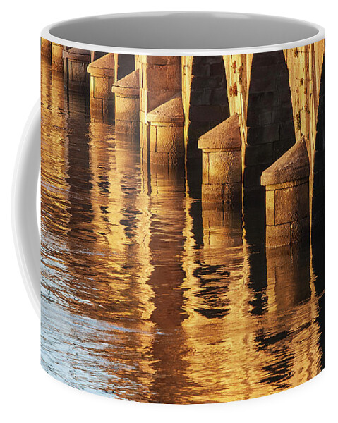 Rocks Coffee Mug featuring the photograph Stone Medieval Viaduct Reflected at Sunset Golden Light Pondedeume Galicia by Pablo Avanzini