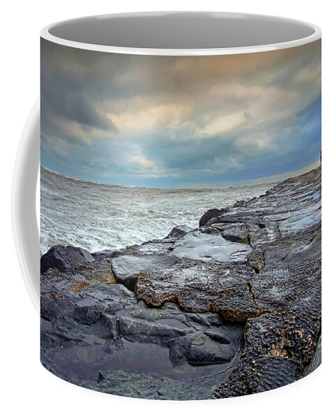 Storm Coffee Mug featuring the photograph Storm Blowing Out by Geoff Crego