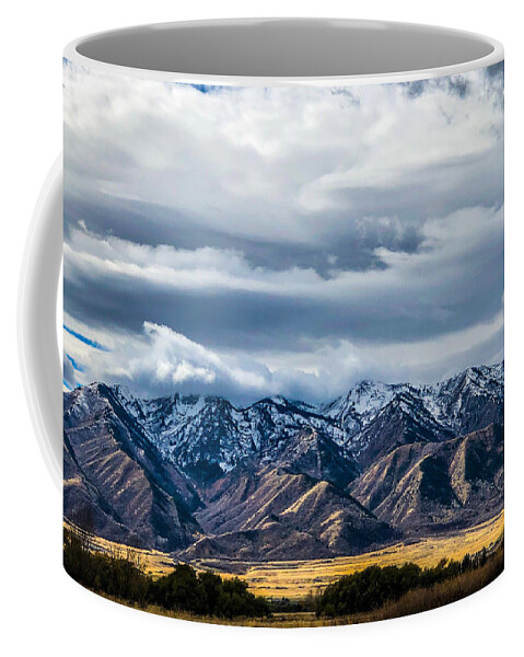 Wellsville Mountains Coffee Mug featuring the photograph Stormy Mountains by Kevin Schwalbe