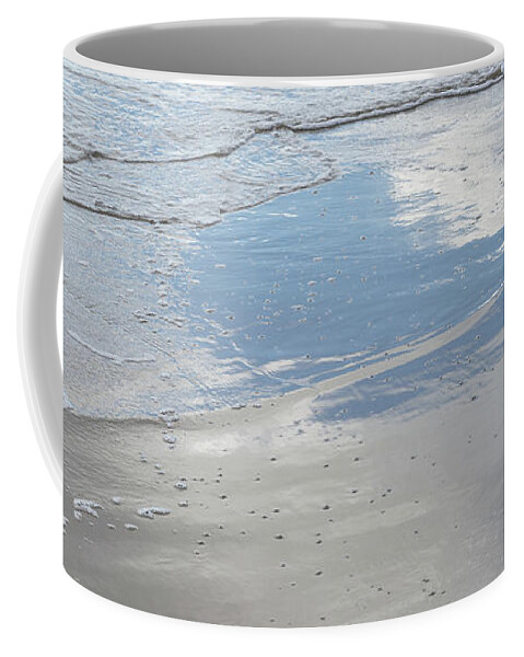 Sea Water Coffee Mug featuring the photograph Subtle waves and reflection in the wet sand by Adriana Mueller
