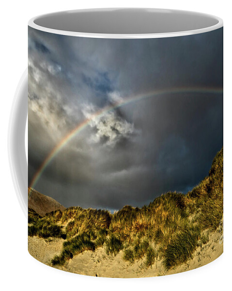 Dramatic Beauty Rainbow Sand Dunes Clouds Grass Landscape Wonderland Panoramic Beautiful West Highlands Elements Sun Rays Atmospheric Dawn Dusk Heavy Powerful Attractive Sky Stunning Delightful Magnificent Singular Transient Spectacular Glory Breath-taking Painterly Vivid Bright Vibrant Golden Autumn Colorful Yellow Artistic Inspirational Serene Tranquil Stylish Magic Poetic Striking Charming Glorious Impression Impressive Storm Thunder Hope Joy Pleasing Stimulating Rusty Fiery Thunderstorm Uk Coffee Mug featuring the photograph Storm Is Gone Away - Dramatic Beauty Of Rainbow At Sand Dunes by Tatiana Bogracheva