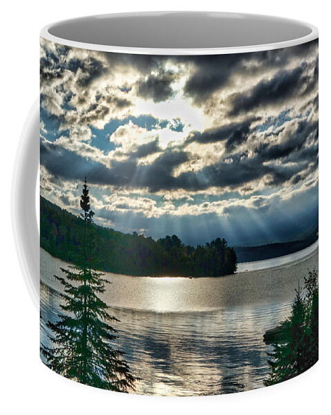 Sun Coffee Mug featuring the photograph Sun Rays and Storm Clouds Over Rangeley Maine by Russel Considine