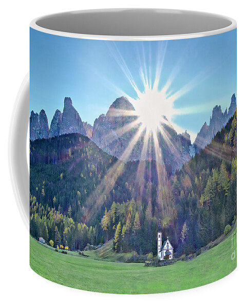 Sunrise Sun Rays Glory Black Mountains Powerful Striking Sunlight Sky Dramatic Beautiful Stunning Magnificent Exciting Landscape Contemporary Serenity Inspirational Serene Stylish Magic Poetic Exceptional Singular Electric Stimulating Thrilling Atmospheric Aesthetic Attractive Radiant Expressive Expression Alluring Scenic Sensational Appealing Brilliant Captivating Fascinating Glamorous Glorious Spectacular Splendid Simplicity Solo Solitary Evocative White Church Vivid Color Dolomites Italy Alps Coffee Mug featuring the photograph Sunrise glory NEW DAY IS RISING DolomItes Italy, St Johann Church, Val di Funes by Tatiana Bogracheva