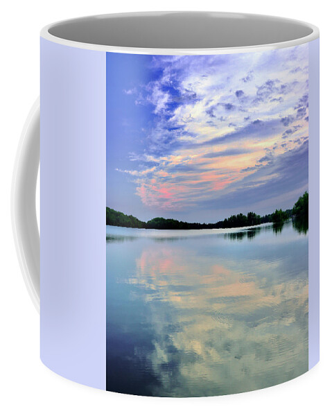 Sunrise Coffee Mug featuring the photograph Sunrise on Nelson Lake by Sarah Lilja