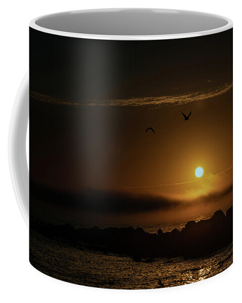 Sunset Coffee Mug featuring the photograph Sunset over the ocean by Micah Offman