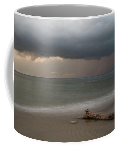Storm Coffee Mug featuring the photograph The coming of the storm from ocean by Michalakis Ppalis