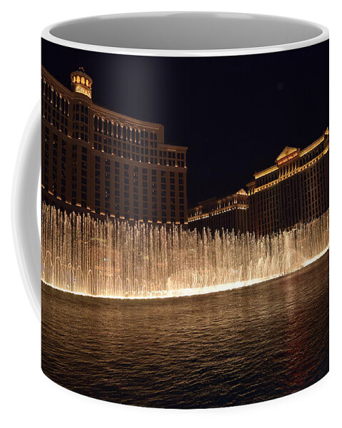 Las Coffee Mug featuring the photograph Stunning Fountain show of Bellagio- Vegas, NV by Bnte Creations