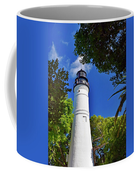 The Key Coffee Mug featuring the photograph The Key West Lighthouse by Monika Salvan