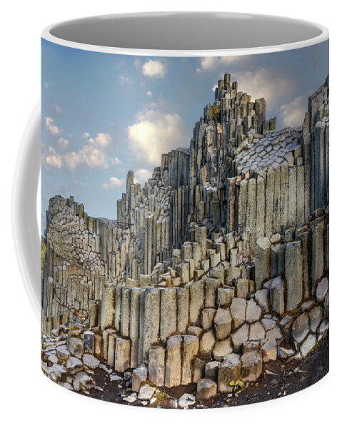 Rock Coffee Mug featuring the photograph The land or hexagonal pillars by Jaroslaw Blaminsky