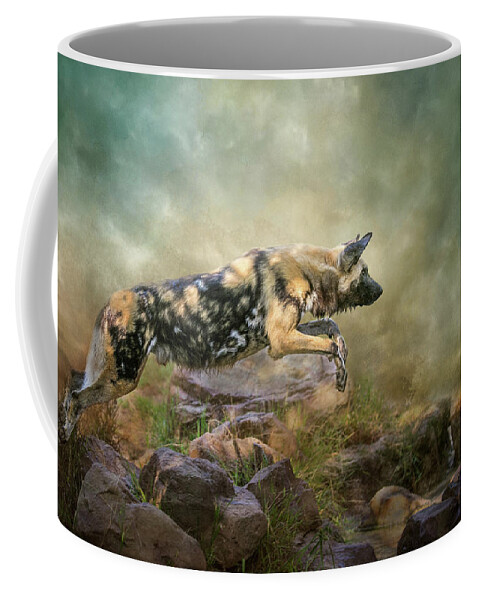 African Wild Dog Coffee Mug featuring the digital art The Leap by Nicole Wilde