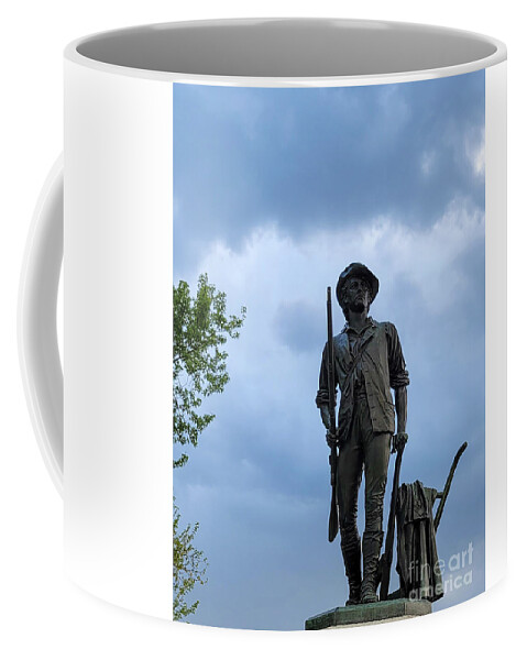 American Patriot Coffee Mug featuring the photograph The Minute Man in Concord by Mary Capriole