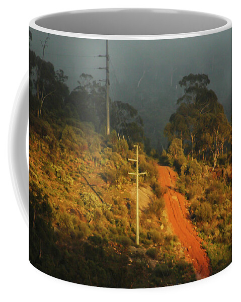 Australia Coffee Mug featuring the photograph The nowhere track - a red earth track leading into the mists of by Jeremy Holton