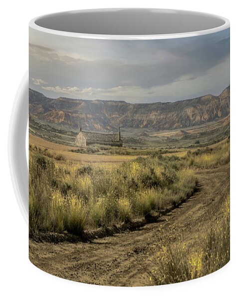 Badlands Coffee Mug featuring the photograph The only house in the Bardenas Reales by Micah Offman