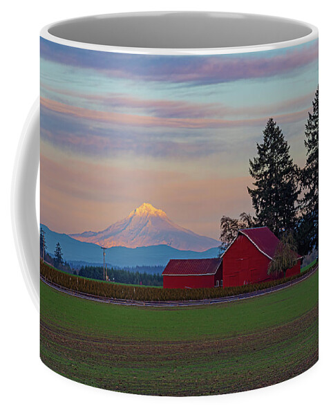  Coffee Mug featuring the photograph The red barn and the mountain. by Ulrich Burkhalter