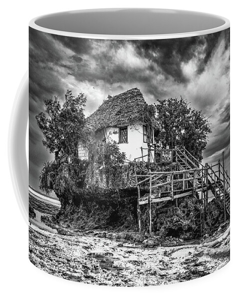 Bungalow Coffee Mug featuring the photograph The Rock, Zanzibar black and white by Lyl Dil Creations