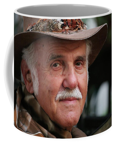 The Man Coffee Mug featuring the photograph They Call Him The Man by Philip And Robbie Bracco