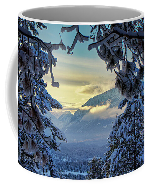 Winter Coffee Mug featuring the photograph Through the trees by Thomas Nay