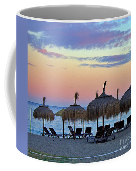 Andalusia Coffee Mug featuring the photograph Tiki Umbrellas and Sunsets by Yvonne M Smith