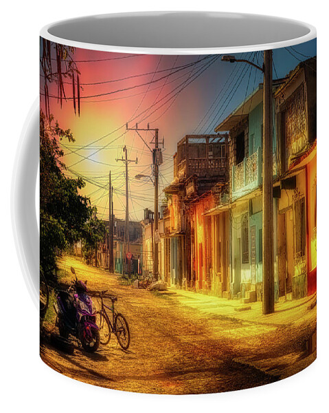 Full Color Coffee Mug featuring the photograph Tropical sun in a side road by Micah Offman