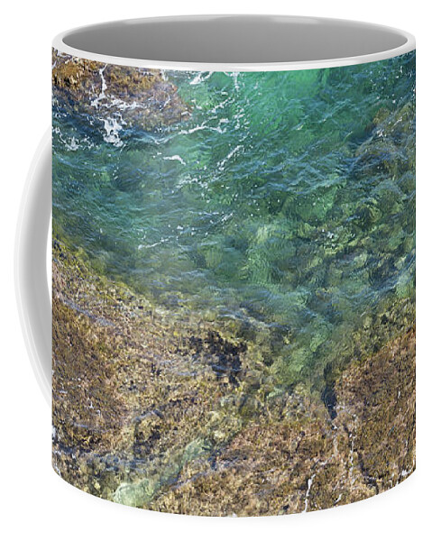 Flowing Coffee Mug featuring the photograph Turquoise Blue Water And Rocks On The Coast by Adriana Mueller