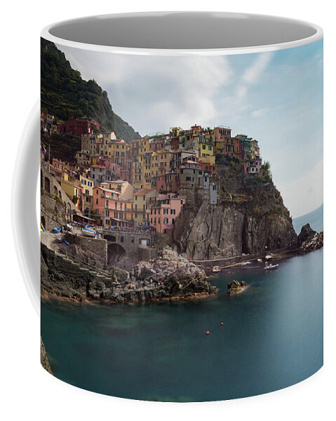 Cinque Terre Coffee Mug featuring the photograph Village of Manarola with colourful houses at the edge of the cliff Riomaggiore, Cinque Terre, Liguria, Italy by Michalakis Ppalis