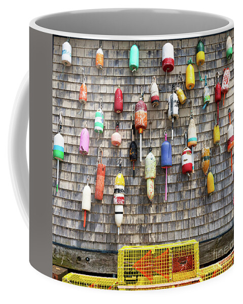 https://render.fineartamerica.com/images/rendered/default/frontright/mug/images/artworkimages/medium/3/vintage-lobster-buoys-hanging-on-a-weathered-wall-with-yellow-tr-david-wood.jpg?&targetx=221&targety=0&imagewidth=358&imageheight=333&modelwidth=800&modelheight=333&backgroundcolor=7A7673&orientation=0&producttype=coffeemug-11