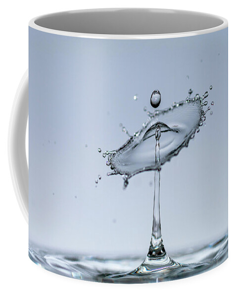 Water drops form mesmerizing transparent sculptures in the form Coffee Mug  by Igor Klyakhin - Fine Art America