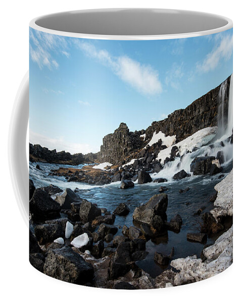 Oxararfoss Coffee Mug featuring the photograph Waterfall flowing into the river, Iceland by Michalakis Ppalis