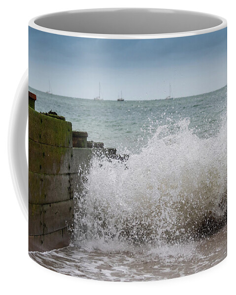 Eastbourne Coffee Mug featuring the photograph Wave splash by Andrew Lalchan