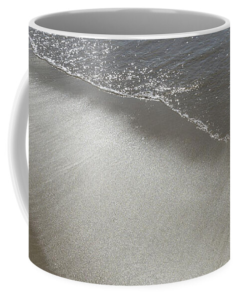Sandy Beach Coffee Mug featuring the photograph Wet sand, sea water and reflections of sunlight 2 by Adriana Mueller