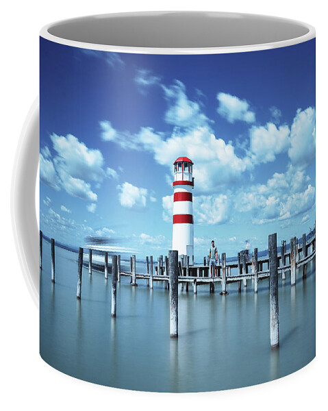 Destinations Coffee Mug featuring the photograph White-red lighthouse in Podersdorf am See by Vaclav Sonnek