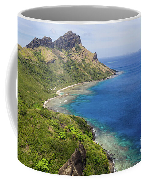 Fiji Coffee Mug featuring the photograph Wild coast of the tropical Waya island in the Yasawa islands gro by Didier Marti