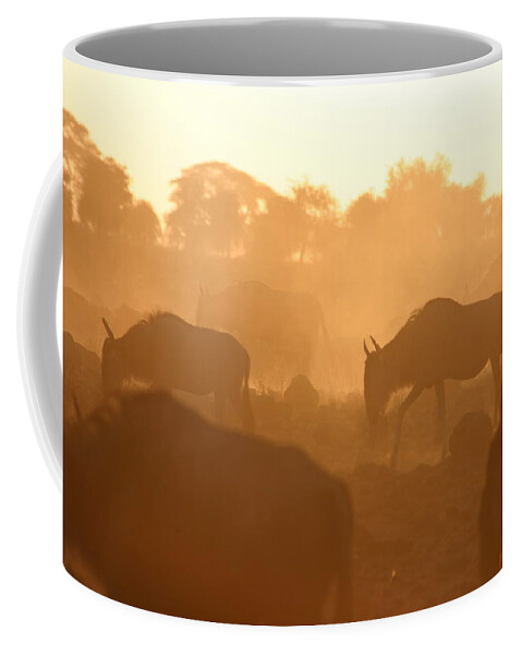 Wildebeest Coffee Mug featuring the photograph Wildebeest Moving by Gene Taylor