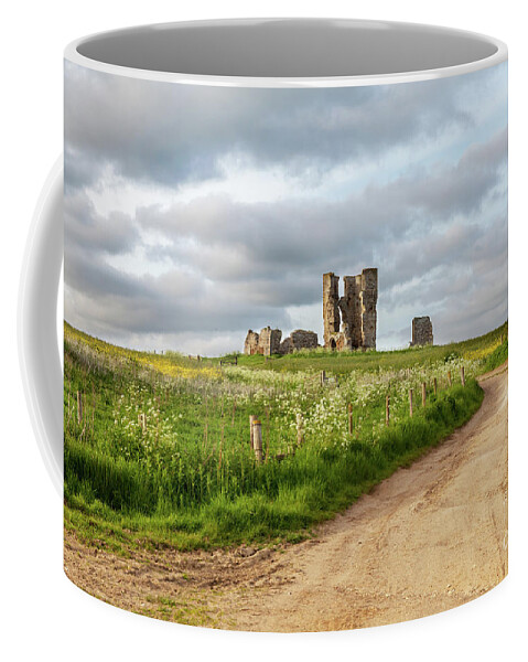 British Coffee Mug featuring the photograph Winding road leading to a chirch ruin in Norfolk by Simon Bratt