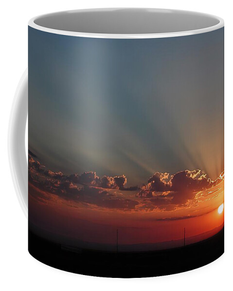 Sunrise Coffee Mug featuring the photograph Winslow Sunrise by DArcy Evans