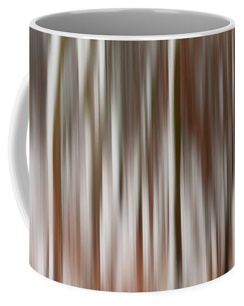 Icm Coffee Mug featuring the photograph Wisconsin Snowblurred -  Intentional camera motion at a snowy tree grove by Peter Herman