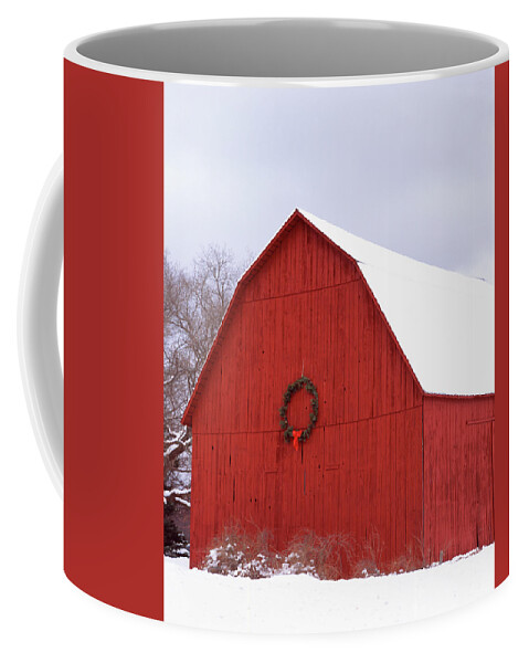 Agricultural Building Agriculture Architecture Bare Tree Barn Building Exterior Celebration Christmas Cold Farm Farmhouse Field Frozen Leelanau County Leland Michigan Red Rural Scene Traditional Culture Travel Destinations Usa Winter Wreath Cold Temperature Color Image Covering Day Gable Hanging No People Outdoors Photography Sky Snow Vertical Built Structure Building Structure Coffee Mug featuring the photograph Wreath hanging on a barn, Leland, Leelanau County, Michigan, USA by Panoramic Images