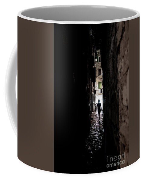  Coffee Mug featuring the photograph Young Woman Walks Alone Through Spooky Narrow Abandoned Alley In The Night by Andreas Berthold